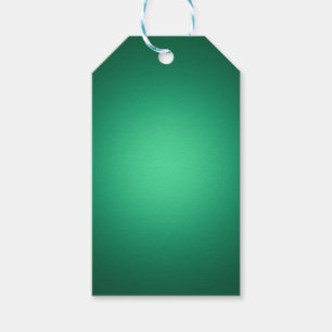 White spotlight on green gift tags