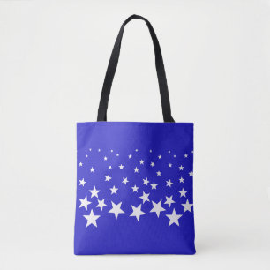 White star pattern on blue background tote bag