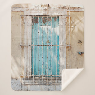 White steel window grill sherpa blanket