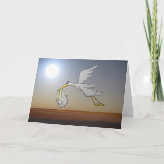 White stork flying in the night sky and full moon card