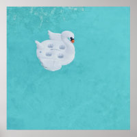 White swan inflatable on body of water