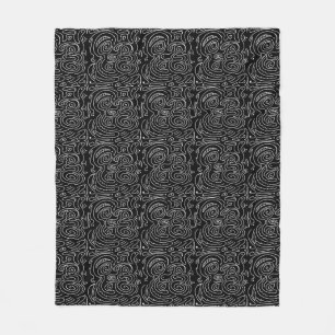 White swirly lines on black fleece blanket