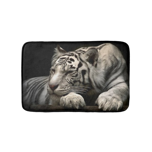 White Tiger Bath Mat (A close-up shot of a white tiger lying down, with its head resting on its paws.)