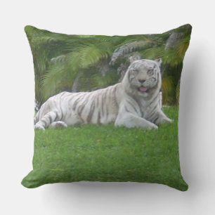 White Tiger Relaxing in Lush Green Grass Cushion