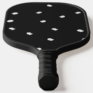 White tiny holes on black pickleball paddle