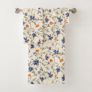 White towel with a floral pattern featuring blue
