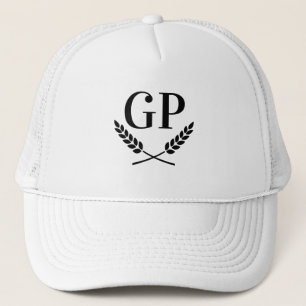 White trucker hat with laurel crest monogram logo