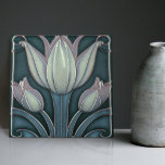 White Tulips on Blue Symmetric Art Nouveau Tile<br><div class="desc">Welcome to CreaTile! Here you will find handmade tile designs that I have personally crafted and vintage ceramic and porcelain clay tiles, whether stained or natural. I love to design tile and ceramic products, hoping to give you a way to transform your home into something you enjoy visiting again and...</div>