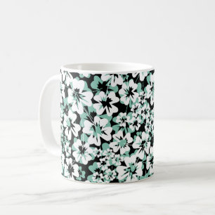 White, turquoise flowers on black. coffee mug