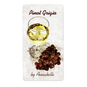 White wine glass with grapes bottle label