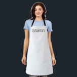 White with Black Letters:   Apron<br><div class="desc">This pretty white apron is a handy thing to have in your kitchen.   Is white not your colour?  Are the letters are too big and plain?  No problem.  You can make changes.  Customisable.  By Sharon Lee Hudson.</div>