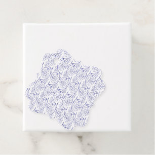 White wrapping paper with a subtle, repeating patt favour tags