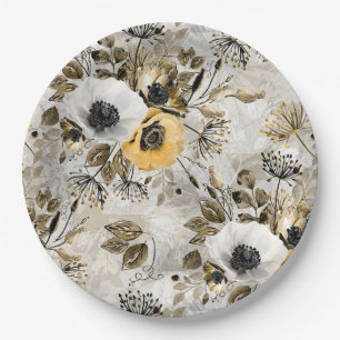White, yellow anemones on a grey-brown background. paper plate
