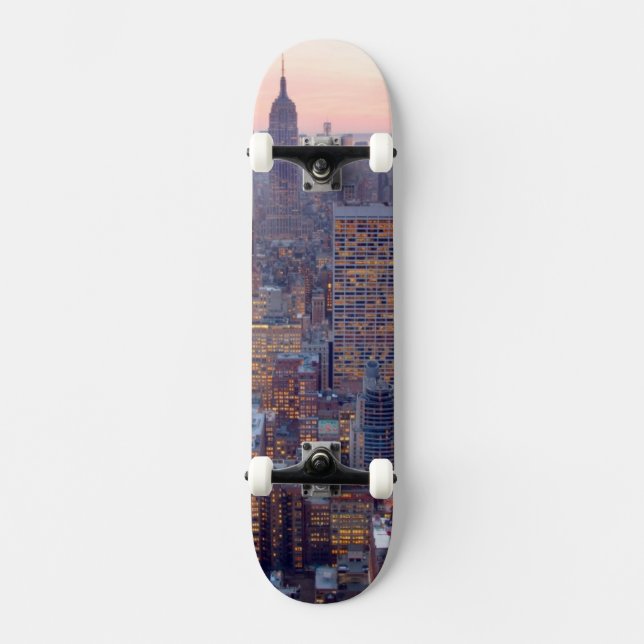 Wide view of Manhattan at sunset Skateboard (Front)