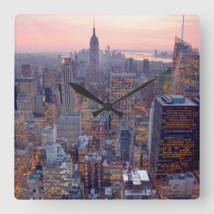 Wide view of Manhattan at sunset Square Wall Clock