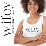 Wifey Just Married Singlet<br><div class="desc">Wifey Just Married Shirt is the perfect way to celebrate your new title in style. Our adorable and modern tee is designed specifically for the bride, making it a must-have for any summer or beach destination wedding and honeymoon. With its playful and trendy vibe, it's the perfect way to announce...</div>