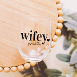 WIFEY | Personalised Name Newlyweds Stemless Wine Glass<br><div class="desc">Celebrate the new Mrs. with this cute text-based honeymoon design featuring "wifey" in black lettering with a small heart illustration. Personalise with her name beneath in handwritten-style script. Matching "hubby" sold separately.</div>