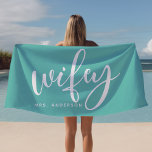 Wifey Teal and White Custom Bride Beach Towel<br><div class="desc">Celebrate your newlywed status with this chic "Wifey" beach towel in teal and white, perfect for honeymoons, beach days, or poolside relaxation. Designed for brides and newlyweds, this towel can be personalised with a last name, making it a unique gift or personal accessory. Made for sunny adventures, it’s a beautiful...</div>