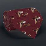 Wild Ducks in Flight Maroon Tie<br><div class="desc">Male and female mallard ducks flying over a golden pond,  water rippling to reflect the colors of the background autumn foliage glowing in the sunlight,  all on a sophisticated maroon patterned background.</div>