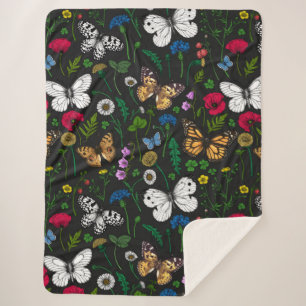 Wild flowers and butterflies on black sherpa blanket