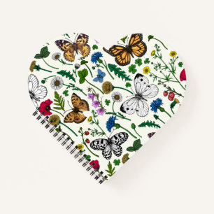 Wild flowers and butterflies on white notebook