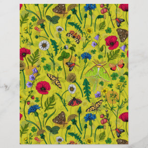 Wild flowers and moths on green