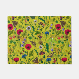 Wild flowers and moths on green doormat