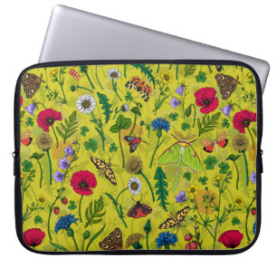 Wild flowers and moths on green laptop sleeve
