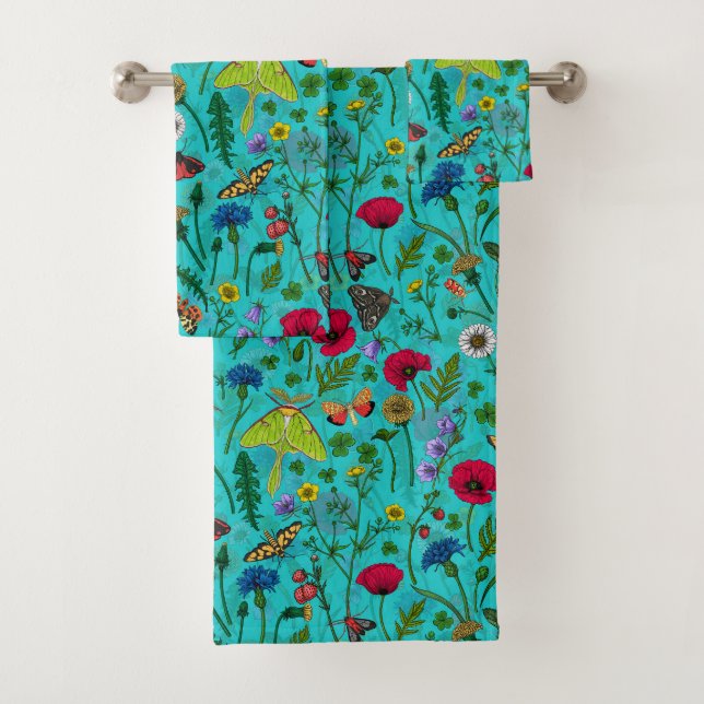 Wild flowers and moths on teal bath towel set (Insitu)