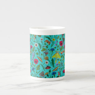Wild flowers and moths on teal bone china mug