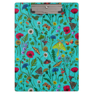 Wild flowers and moths on teal clipboard