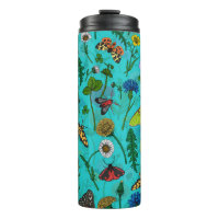 Wild flowers and moths on teal
