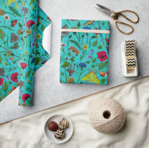 Wild flowers and moths on teal wrapping paper