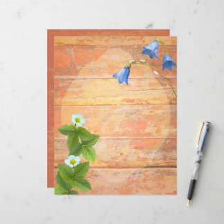 Wild flowers on a worn board background