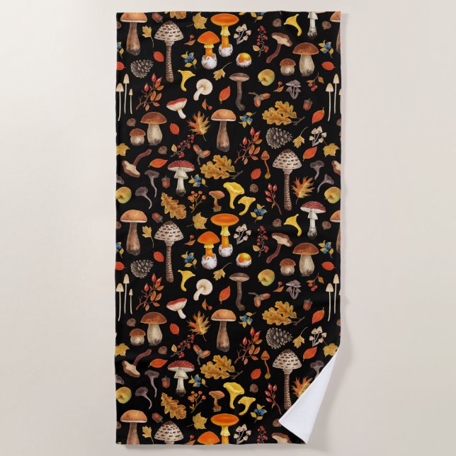 Wild mushrooms on black beach towel (Front)
