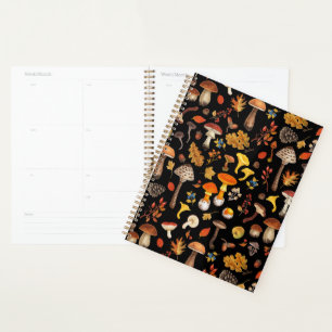 Wild mushrooms on black planner