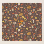 Wild mushrooms on brown scarf<br><div class="desc">Step into a woodland wonderland with this pattern featuring an array of wild mushrooms,  autumn leaves,  berries,  and acorns. Painted in rich autumnal colours,  each element brings the essence of the forest to life,  showcasing nature's diversity and charm.</div>
