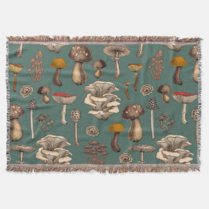 Wild Mushrooms  on pine green Throw Blanket