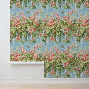 WILD ROSES ,GREEN LEAVES ,FLYING BIRD IN BLUE SKY  WALLPAPER