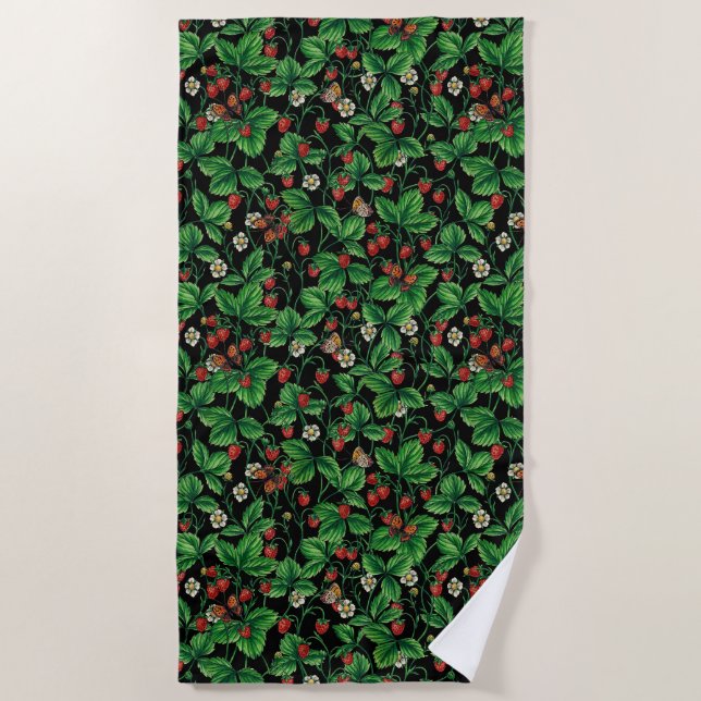 Wild strawberries on black beach towel (Front)