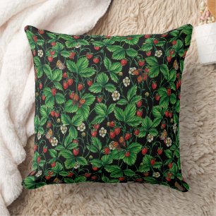 Wild strawberries on black cushion