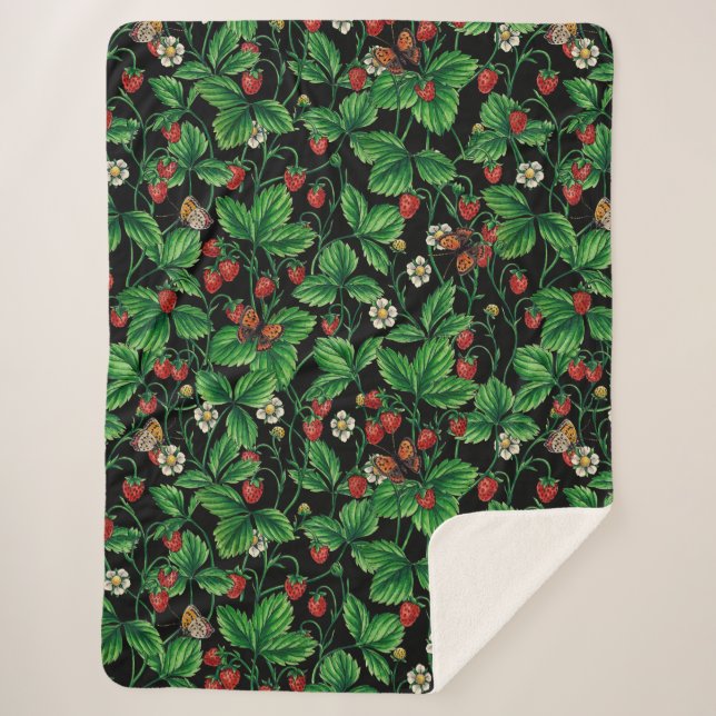Wild strawberries on black sherpa blanket (Front)