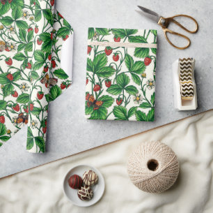 Wild strawberries on off white wrapping paper