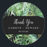 Wild Tropical Palm | Black Thank You Favour Sticke Classic Round Sticker<br><div class="desc">These wild tropical palm black thank you favour stickers are perfect for a beach or destination wedding reception. The design features an exotic array of green watercolor banana palm tree leaves, ferns, foliage, botanical plants and greenery on a black background for a bold tropical summer feel. Personalise the sticker labels...</div>