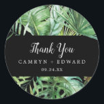 Wild Tropical Palm | Black Thank You Favour Sticke Classic Round Sticker<br><div class="desc">These wild tropical palm black thank you favour stickers are perfect for a beach or destination wedding reception. The design features an exotic array of green watercolor banana palm tree leaves, ferns, foliage, botanical plants and greenery on a black background for a bold tropical summer feel. Personalise the sticker labels...</div>