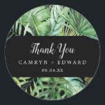 Wild Tropical Palm | Black Thank You Favour Sticke Classic Round Sticker<br><div class="desc">These wild tropical palm black thank you favour stickers are perfect for a beach or destination wedding reception. The design features an exotic array of green watercolor banana palm tree leaves, ferns, foliage, botanical plants and greenery on a black background for a bold tropical summer feel. Personalise the sticker labels...</div>