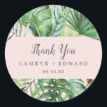 Wild Tropical Palm | Blush Thank You Favour Sticke Classic Round Sticker<br><div class="desc">These wild tropical palm blush thank you favour stickers are perfect for a beach or destination wedding reception. The design features an exotic array of green watercolor banana palm tree leaves, ferns, foliage, botanical plants and greenery on a blush pink background for a tropical summer feel. Personalise the sticker labels...</div>