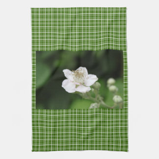 Wild white raspberry flower. tea towel