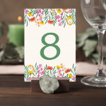 Wildflower Botanical Wedding Table Number Card<br><div class="desc">Guide guests to their tables with this elegant wildflower wedding table number card. Framed with delicate garden florals and fresh greenery, this design brings a romantic botanical touch to your reception tables while maintaining a clean and timeless layout. Colorful wildflowers and soft greenery create a natural floral border that feels...</div>