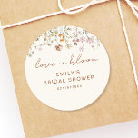 Wildflower Thank You Bridal Shower Love In Bloom Classic Round Sticker<br><div class="desc">Express gratitude with our Wildflower Thank You Bridal Shower In Bloom Classic Round Sticker. These charming stickers feature a delightful wildflower design, infusing a touch of natural beauty into your bridal shower thank-you notes or favours. The classic round shape adds versatility, making them perfect for various uses, from sealing envelopes...</div>